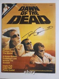 Livre d'affiches de Dawn of the Dead de 1978, signé 2 fois par Tom Savini et 1 fois par David Emge